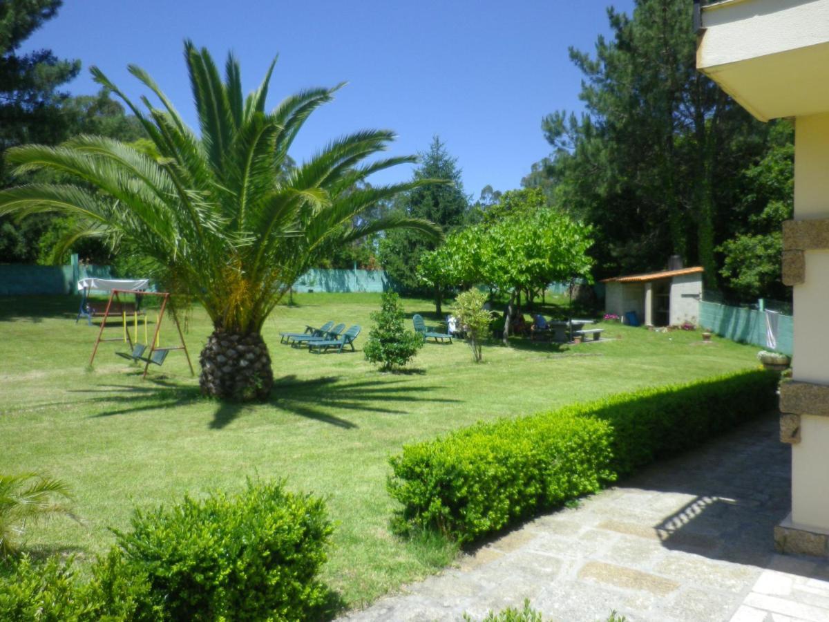 Apartamentos En Playa Canelas Portonovo Bagian luar foto