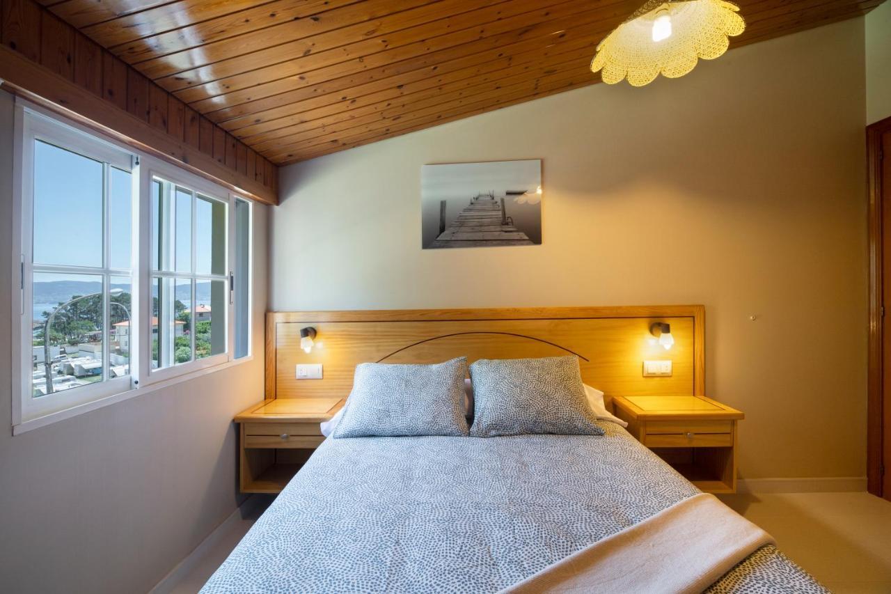 Apartamentos En Playa Canelas Portonovo Bagian luar foto